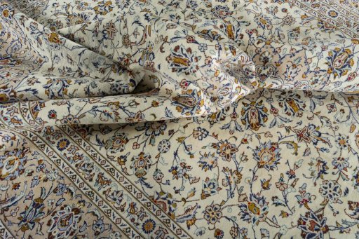 Surface texture of 2000s Kashan rug with natural Wool and intricate pattern