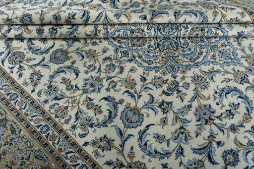 Close-up detail of 2000s Kashan rug from Iran / Persia showing Wool weave