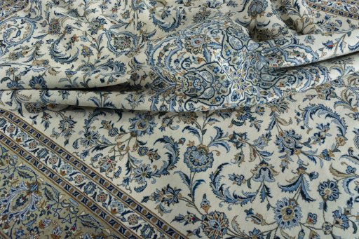 Surface texture of 2000s Kashan rug with natural Wool and intricate pattern