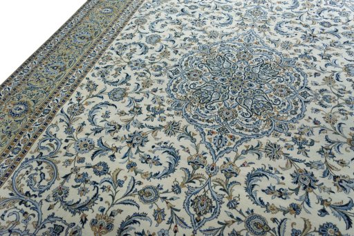 Backside of handmade 2000s Kashan rug showing knot structure and weave density