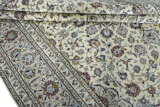 Close-up detail of 2000s Kashan rug from Iran / Persia showing Wool weave