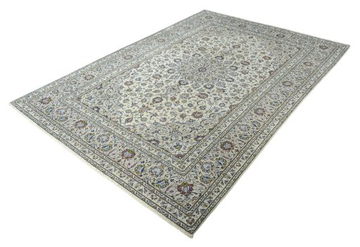 Corner detail of 2000s Kashan rug showing border pattern and Wool pile