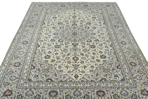 Surface texture of 2000s Kashan rug with natural Wool and intricate pattern