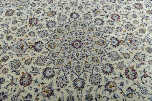 Central medallion detail of 2000s Kashan rug from Iran / Persia