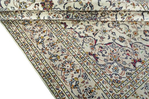 Close-up detail of 2000s Kashan rug from Iran / Persia showing Wool weave