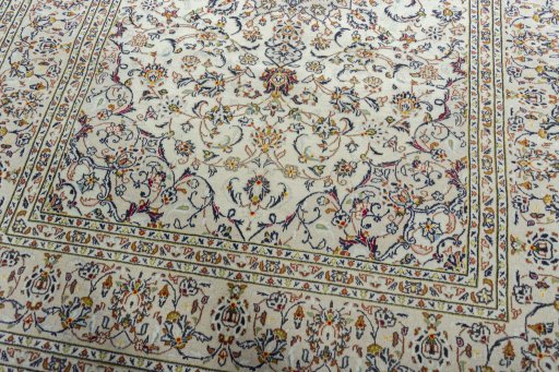 Close-up detail of 2000s Kashan rug from Iran / Persia showing Wool weave
