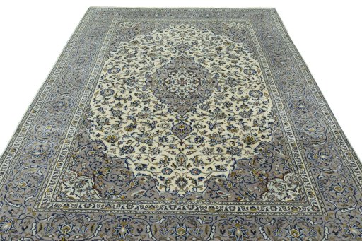 Surface texture of 2000s Kashan rug with natural Wool and intricate pattern