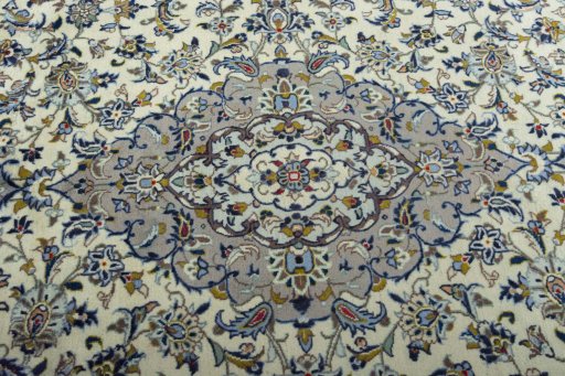 Central medallion detail of 2000s Kashan rug from Iran / Persia