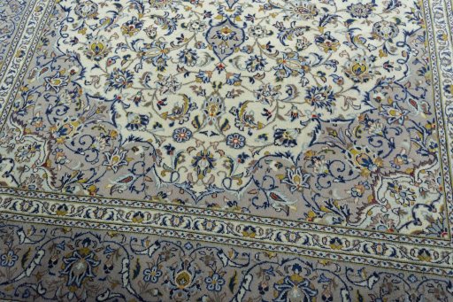 Close-up detail of 2000s Kashan rug from Iran / Persia showing Wool weave