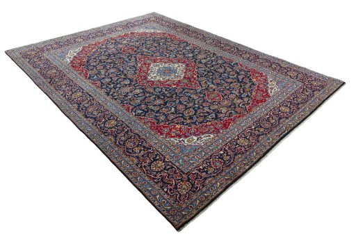 Close-up detail of 2000s Kashan rug from Iran / Persia showing Wool weave