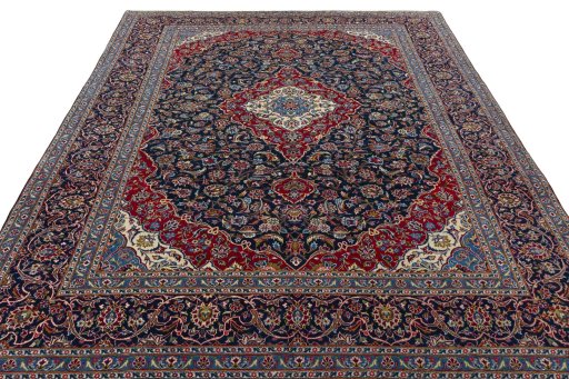 Surface texture of 2000s Kashan rug with natural Wool and intricate pattern