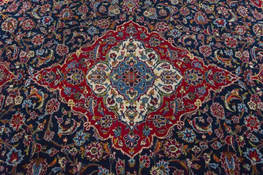 Central medallion detail of 2000s Kashan rug from Iran / Persia