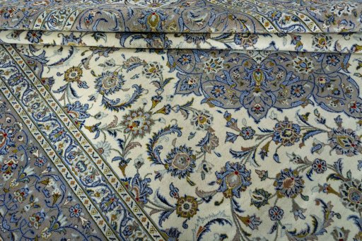 Close-up detail of 2000s Kashan rug from Iran / Persia showing Wool weave