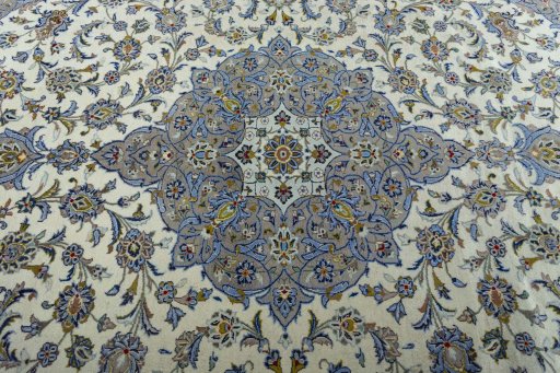 Central medallion detail of 2000s Kashan rug from Iran / Persia