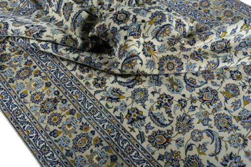 Surface texture of 2000s Kashan rug with natural Wool and intricate pattern