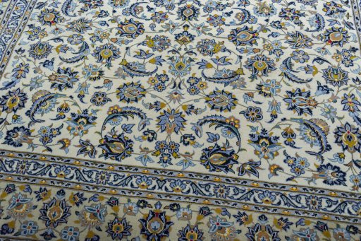 Close-up detail of 2000s Kashan rug from Iran / Persia showing Wool weave