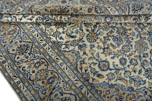 Close-up detail of 2000s Kashan rug from Iran / Persia showing Wool weave