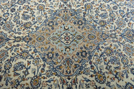 Central medallion detail of 2000s Kashan rug from Iran / Persia