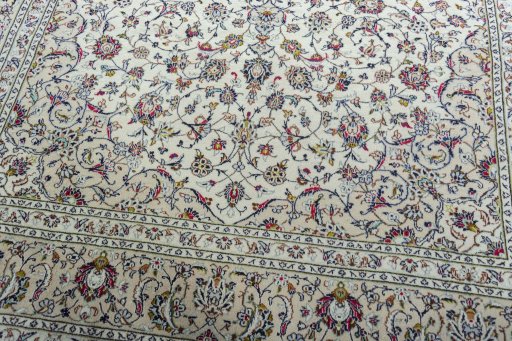 Close-up detail of 2000s Kashan rug from Iran / Persia showing Wool weave