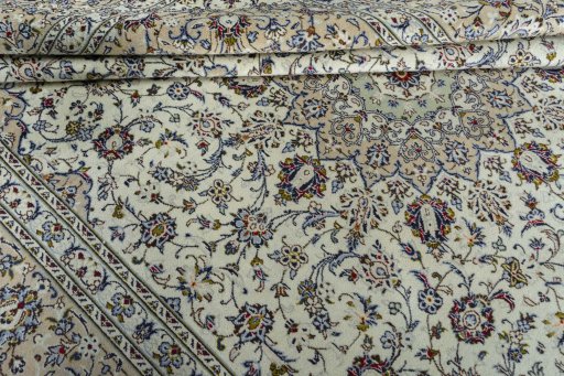 Close-up detail of 2000s Kashan rug from Iran / Persia showing Wool weave