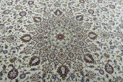 Central medallion detail of 2000s Kashan rug from Iran / Persia