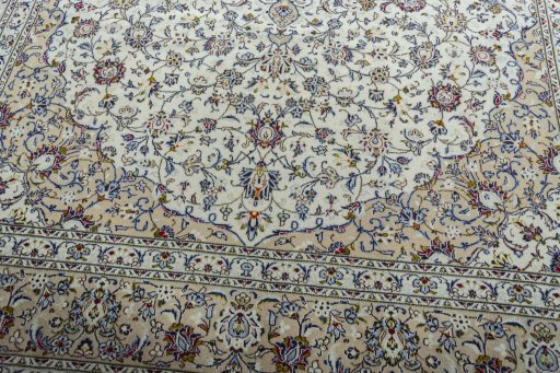 Close-up detail of 2000s Kashan rug from Iran / Persia showing Wool weave
