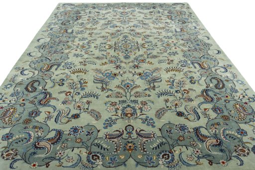 Surface texture of 2000s Kashan rug with natural Wool and intricate pattern