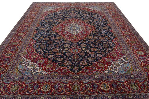Surface texture of 2000s Kashan rug with natural Wool and intricate pattern