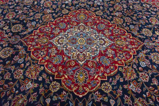 Central medallion detail of 2000s Kashan rug from Iran / Persia