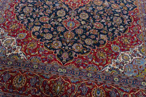 Close-up detail of 2000s Kashan rug from Iran / Persia showing Wool weave