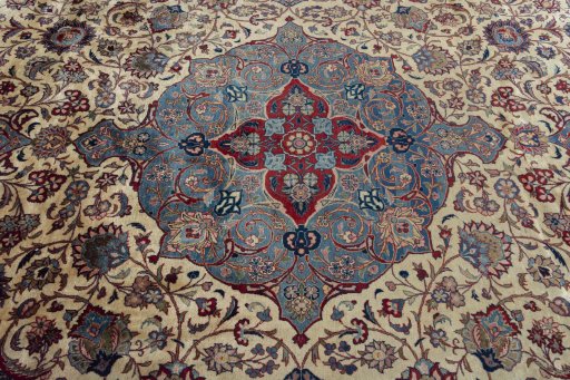 Central medallion detail of 1930s Kashan rug from Iran / Persia
