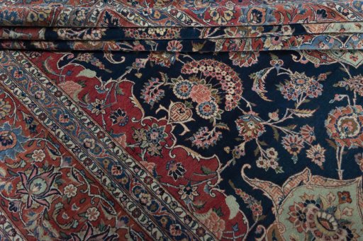 Close-up detail of 1930s Kashan rug from Iran / Persia showing Wool weave