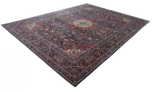 Corner detail of 1930s Kashan rug showing border pattern and Wool pile