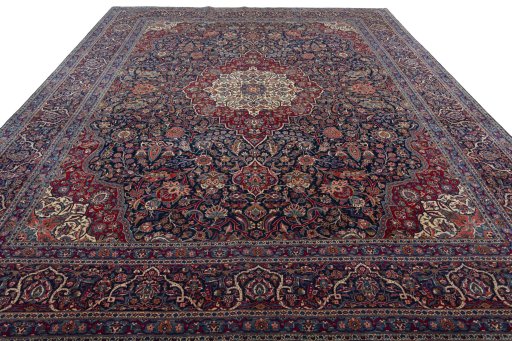 Surface texture of 1930s Kashan rug with natural Wool and intricate pattern