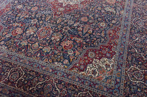 Close-up detail of 1930s Kashan rug from Iran / Persia showing Wool weave