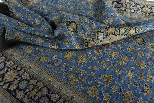 Surface texture of 2000s Kashan rug with natural Wool and intricate pattern