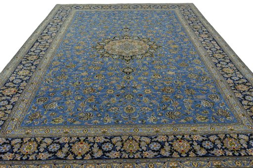 Surface texture of 2000s Kashan rug with natural Wool and intricate pattern