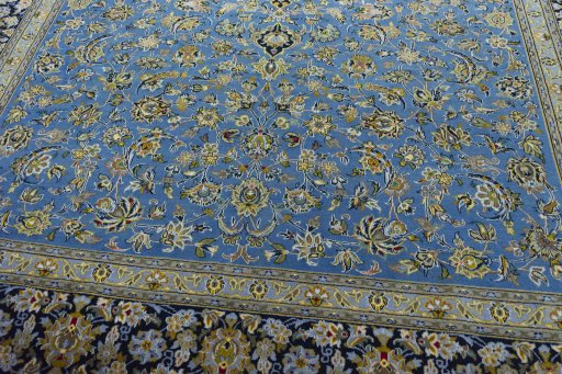 Close-up detail of 2000s Kashan rug from Iran / Persia showing Wool weave