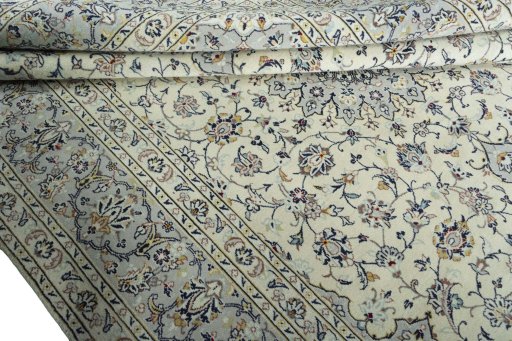 Close-up detail of 2000s Kashan rug from Iran / Persia showing Wool weave