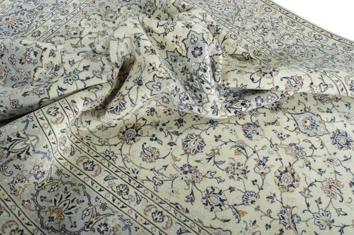 Surface texture of 2000s Kashan rug with natural Wool and intricate pattern