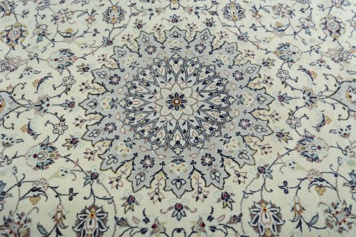 Central medallion detail of 2000s Kashan rug from Iran / Persia