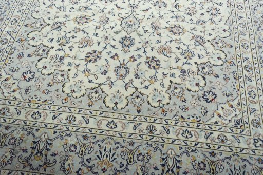 Close-up detail of 2000s Kashan rug from Iran / Persia showing Wool weave