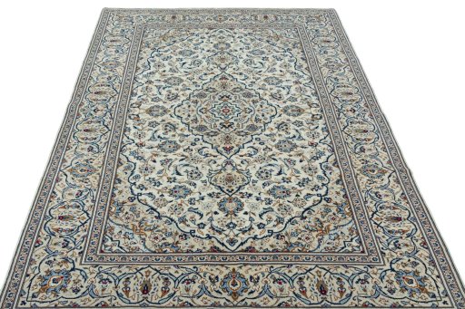 Surface texture of 2000s Kashan rug with natural Wool and intricate pattern