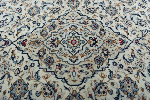 Central medallion detail of 2000s Kashan rug from Iran / Persia