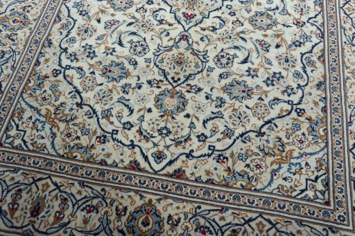Close-up detail of 2000s Kashan rug from Iran / Persia showing Wool weave