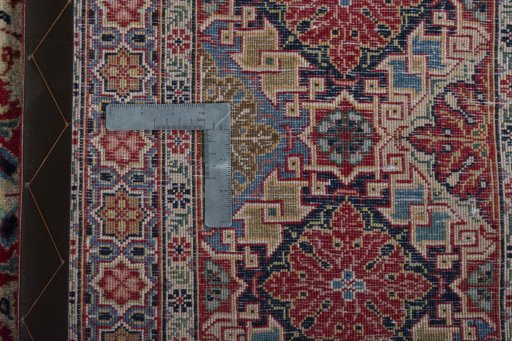 Close-up detail of 1950s Kashan rug from Iran / Persia showing Wool weave