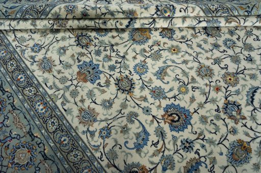 Close-up detail of 2000s Kashan rug from Iran / Persia showing Wool weave