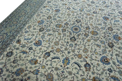 Backside of handmade 2000s Kashan rug showing knot structure and weave density