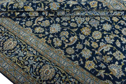 Surface texture of 2000s Kashan rug with natural Wool and intricate pattern
