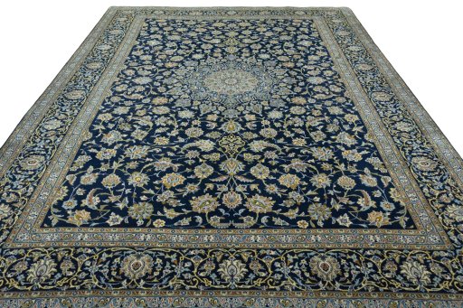 Surface texture of 2000s Kashan rug with natural Wool and intricate pattern